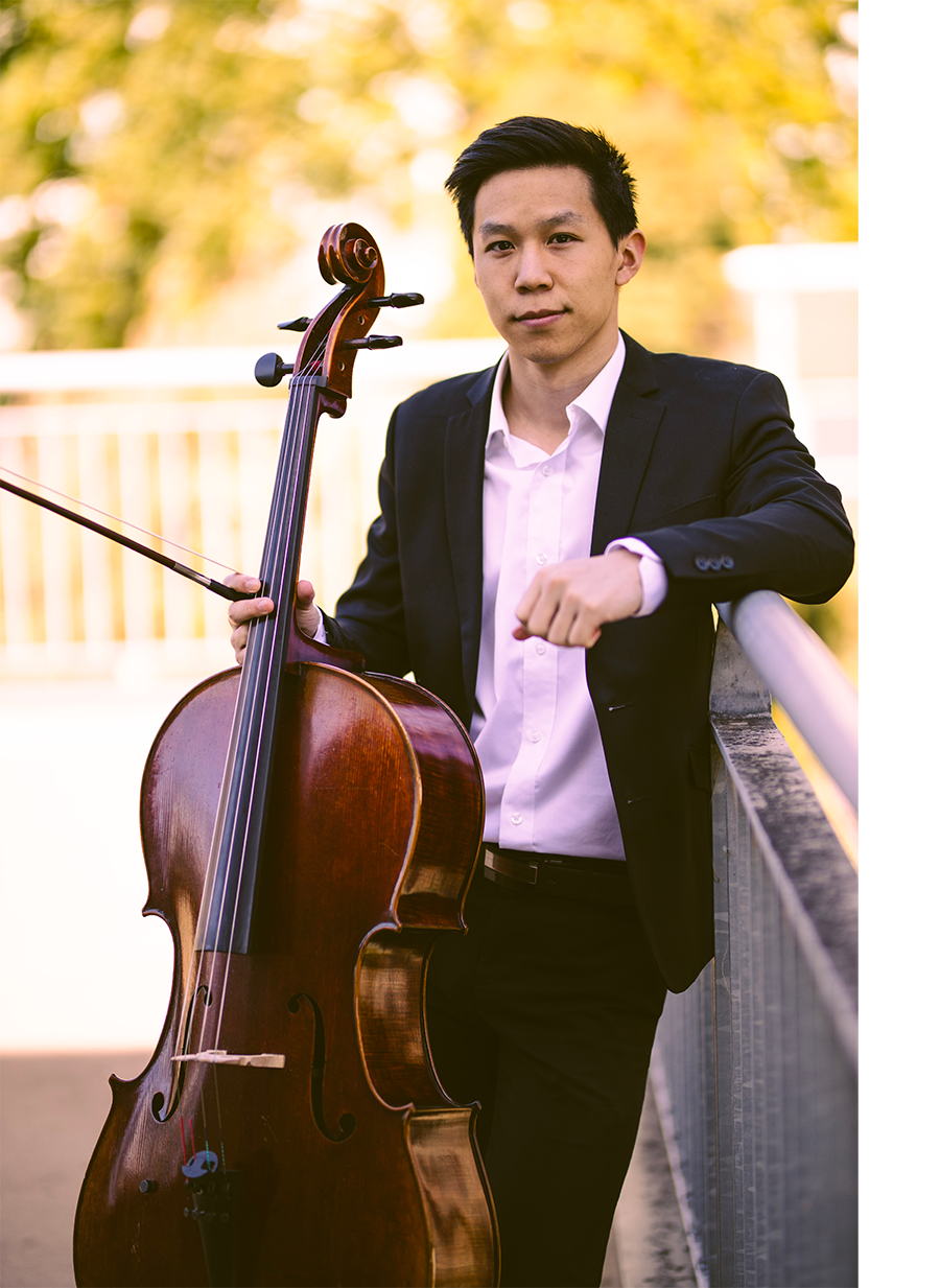 "Caleb Wong posing with his cello against a sunny background"